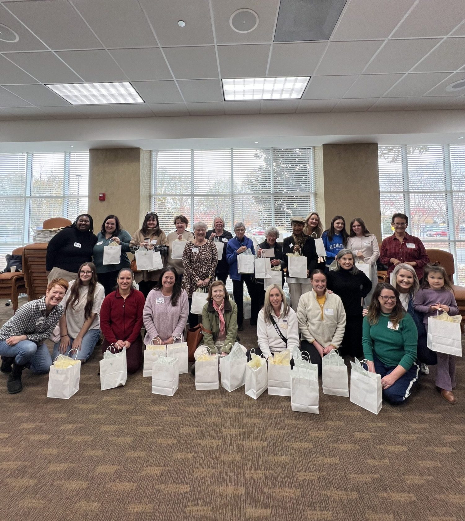 Women United Members Prepare New Mom & Baby Kits for Stepping Stone