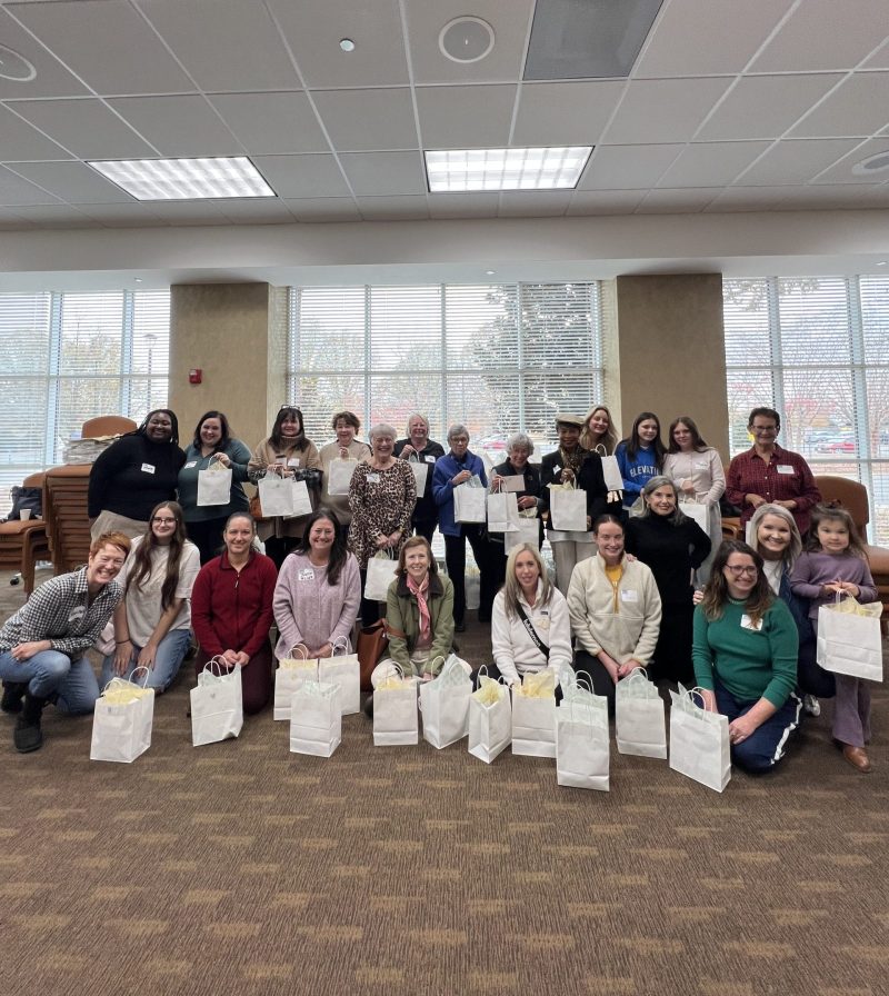 Women United Members Prepare New Mom & Baby Kits for Stepping Stone